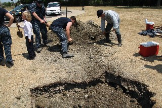 Almost done burying time capsule